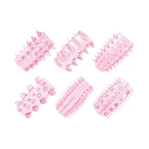 Kit manșoane pentru penis TOYZ4LOVERS Pleasure. pentru stimulare intensă și îngroșare. cu 6 tipuri de striații. roz transparent